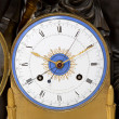 An important Empire gilt bronze and marble sculptural mantel clock 'Amor and Psyche'