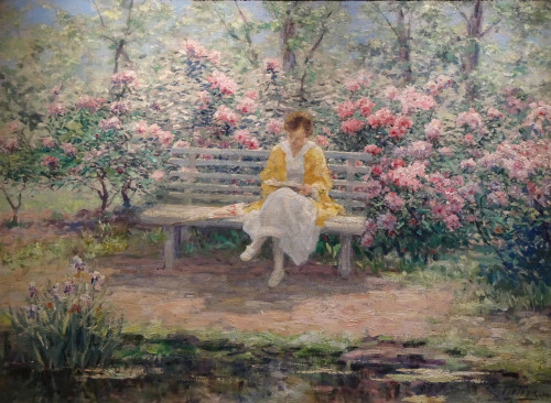 Reading woman in garden